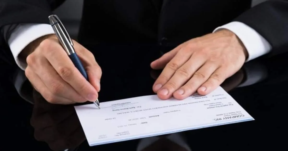 businessperson-signing-cheque-1016675-1-1-_1200x630xt.jpg