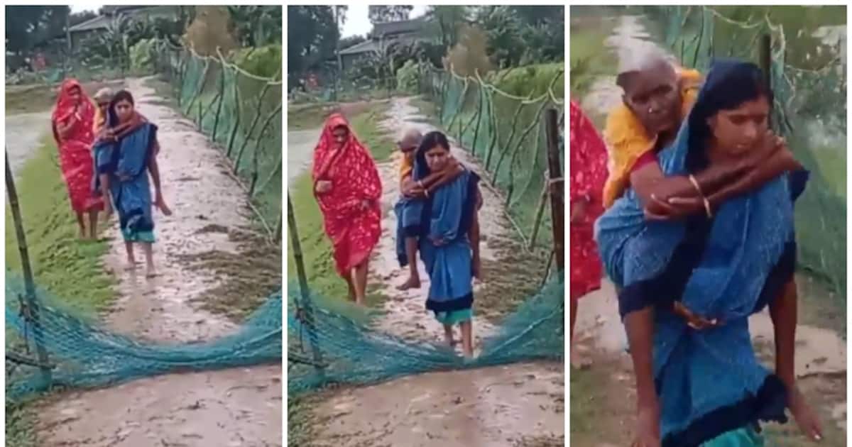 cyclone-dana-asha-worker-carries-old-woman-on-the-back-in-bhadrak_1200x630xt.jpg