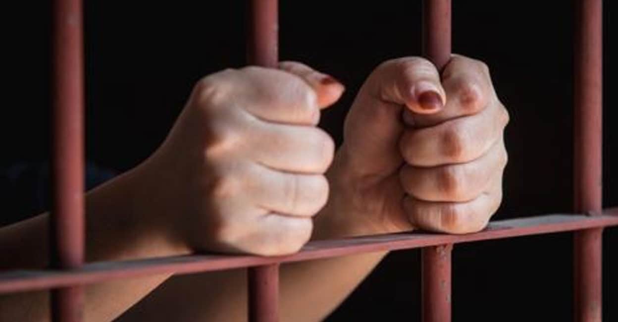woman-in-jail-prison-2203.jpg