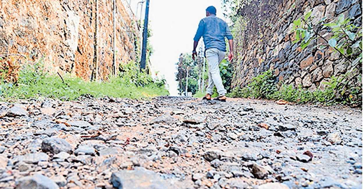 kannur-thalassery-road-potholes-1.jpg