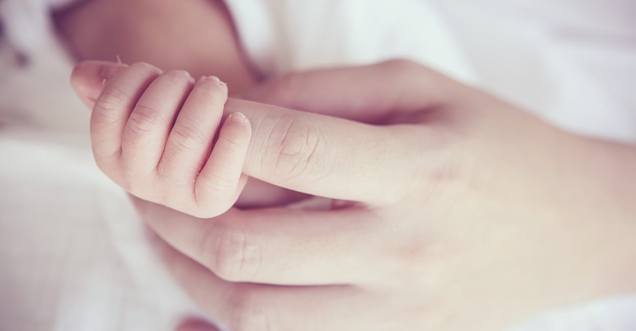 soft-focus-of-baby-hands-and-mom-new-family-and-baby-healthy-concept-infant-health-donot6-studio-shu.jpeg