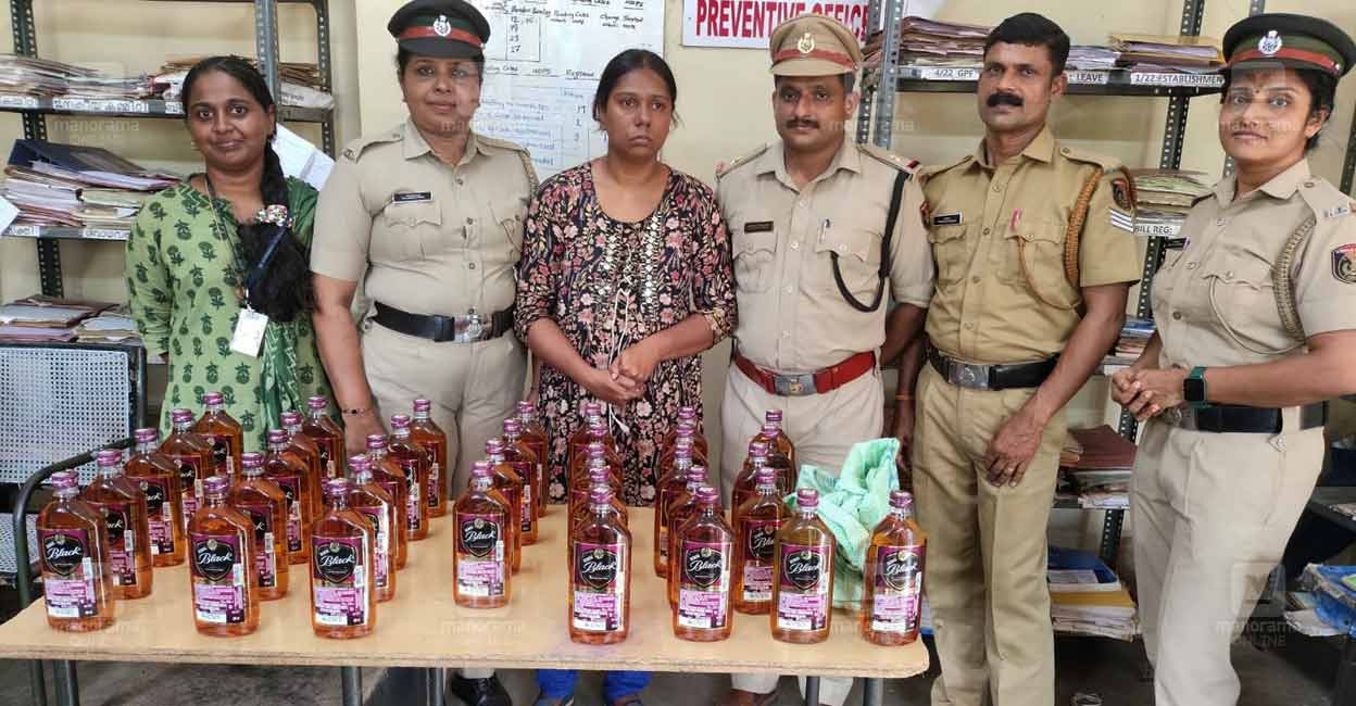 thalassery-woman-arrested-with-mahe-liquor.jpg
