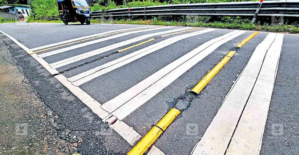 mundakkayam-s-turn-bar-marking.jpg