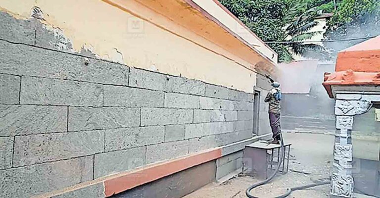 kollam-removing-paint-from-aryankavu-dharmashasta-temple.jpg