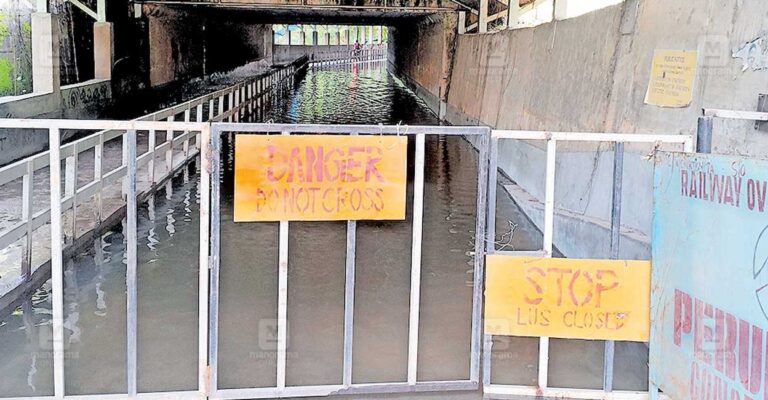 thirumulapuram-road-waterlogged.jpg
