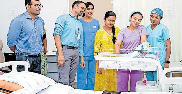 ekm-aluva-amrutha-and-baby.jpg