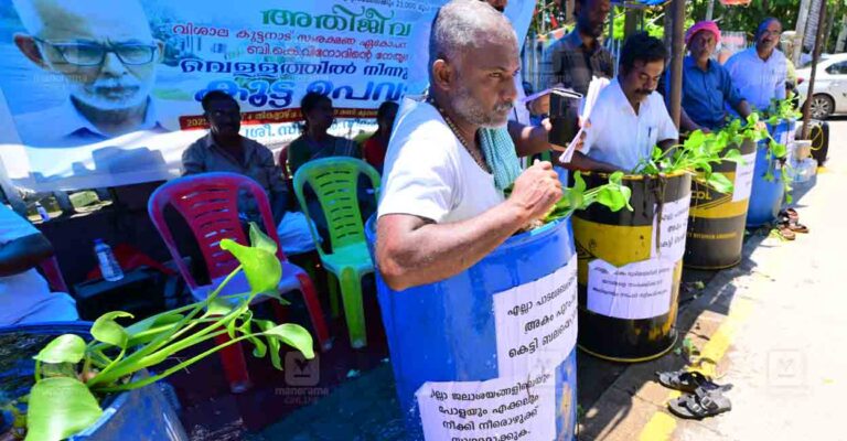kuttanad-flood-relief-protest.jpg