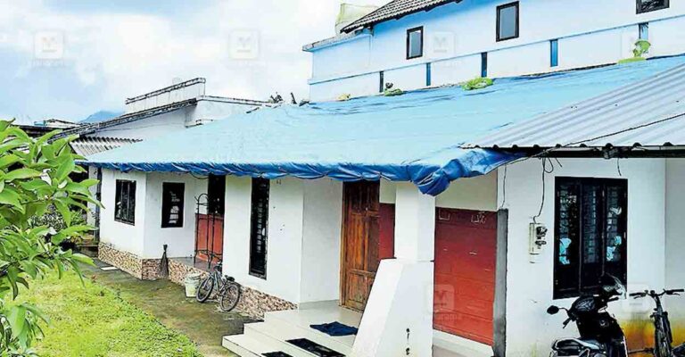 wayanad-house-tar-pollin.jpg