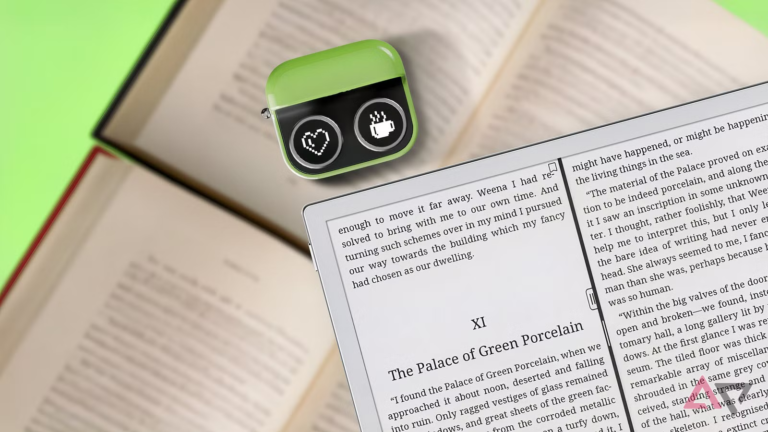 boox-e-reader-with-a-boox-tappy-placed-on-top-of-open-books.png