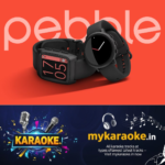 newskerala.net_1780744694_two-pebble-smartwatches-displayed-on-a-red-background-with-the-pebble-logo-behind-them