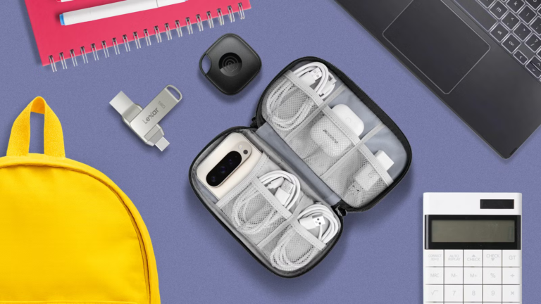 an-open-tech-pouch-a-lexar-dual-usb-drive-and-a-black-tile-tracker-on-a-student-desk-1.png