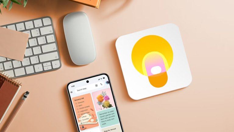 google-keep-app-on-a-smartphone-beside-the-google-keep-icon-on-a-desk.png