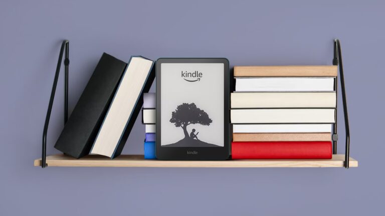 kindle-e-reader-displayed-on-a-shelf-surrounded-by-books.jpg