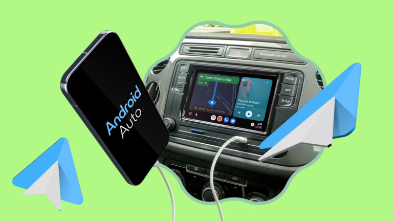 smartphone-connected-by-a-white-cable-to-a-car-dashboard-running-android-auto.png