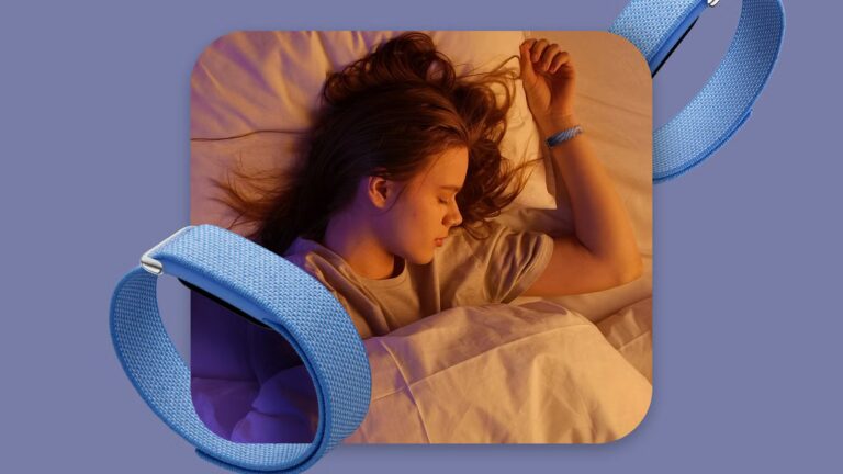 woman-sleeping-while-wearing-a-blue-google-fitbit-air-tracker-device.jpg