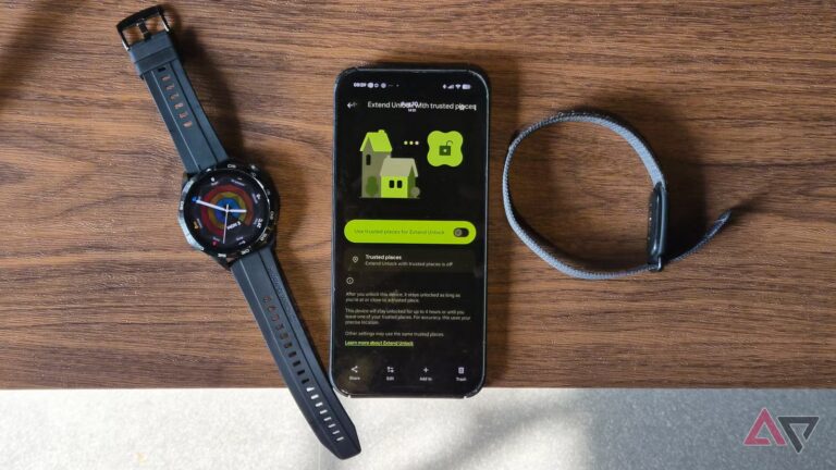 google-pixel-phone-with-huawei-watch-and-fitbit-air-tracker-on-a-table.jpg