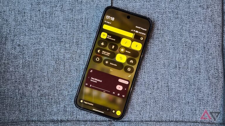 google-pixel-smartphone-on-a-couch-showing-quick-settings-panel.jpg