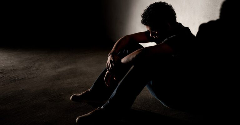 pravasi-malayali-gulf-job-legal-traps-debt-imprisonment-man-depressed-in-jail-room.jpg