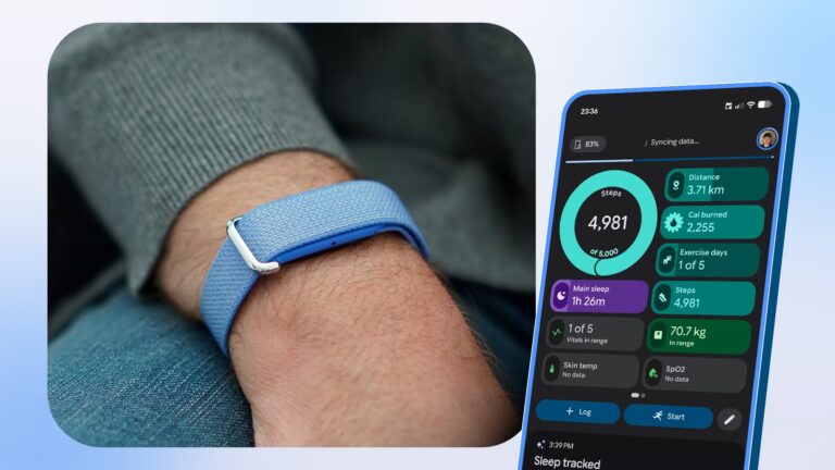 fitbit-air-worn-on-a-wrist-next-to-a-smartphone-displaying-health-and-fitness-stats.jpg